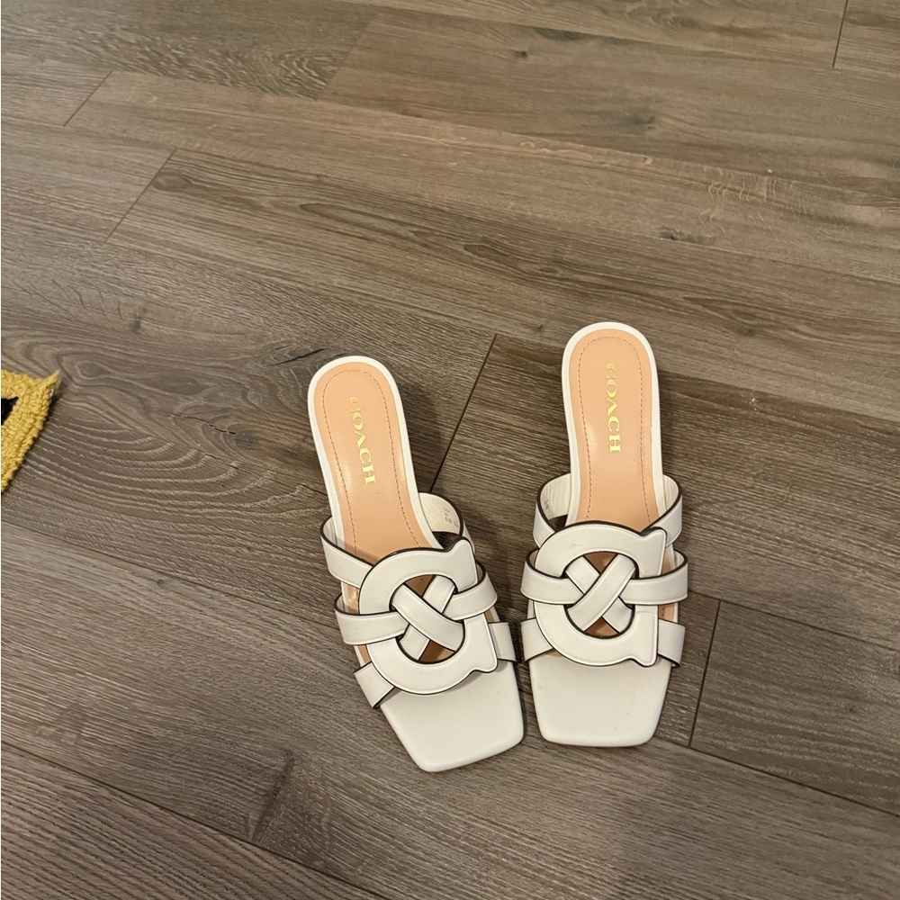 Coach Women's Cream Mules with Interlocking Design